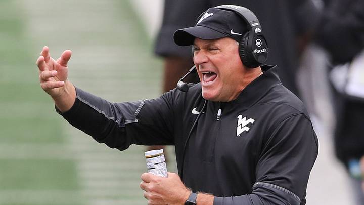 Oct 10, 2026; Morgantown, West Virginia, USA; West Virginia Mountaineers head coach Rich Rodriguez yells from the sideline during the second quarter against the Arizona Wildcats at Milan Puskar Stadium. Mandatory Credit: Ben Queen-Imagn Images Oct 10, 2026; Morgantown, West Virginia, USA; West Virginia Mountaineers head coach Rich Rodriguez yells from the sideline during the second quarter against the Arizona Wildcats at Milan Puskar Stadium. Mandatory Credit: Ben Queen-Imagn Images