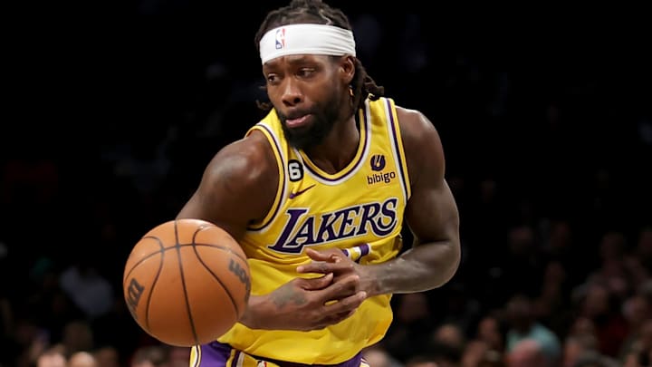 Brooklyn Nets guard Cam Thomas (24) knocks the ball away from Los Angeles Lakers guard Patrick Beverley (21) during the fourth quarter at Barclays Center.