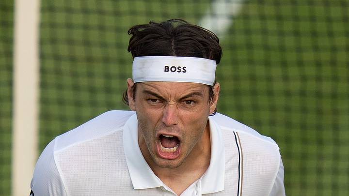 Taylor Fritz celebrates winning his match at Wimbledon Taylor Fritz celebrates winning his match at Wimbledon