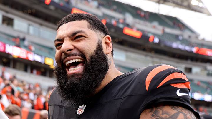 Dec 28, 2025; Cincinnati, Ohio, USA; Cincinnati Bengals guard Cody Ford (61) celebrates after a game against the Arizona Cardinals during the second half at Paycor Stadium. Mandatory Credit: Joseph Maiorana-Imagn Images Dec 28, 2025; Cincinnati, Ohio, USA; Cincinnati Bengals guard Cody Ford (61) celebrates after a game against the Arizona Cardinals during the second half at Paycor Stadium. Mandatory Credit: Joseph Maiorana-Imagn Images