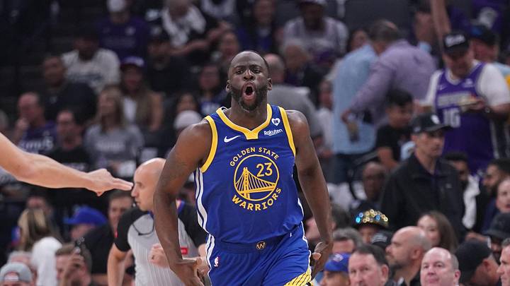 Sacramento, California, USA; Golden State Warriors forward Draymond Green (23) reacts after making a three point basket against the Sacramento Kings in the first quarter during a play-in game of the 2024 NBA playoffs at the Golden 1 Center. Mandatory Credit: Cary Edmondson-Imagn Images