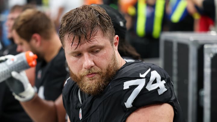 Sep 28, 2025; Paradise, Nevada, USA; Las Vegas Raiders offensive tackle Kolton Miller (74) drinks water from the sidelines during the second half against the Chicago Bears  at Allegiant Stadium. Mandatory Credit: Kiyoshi Mio-Imagn Images