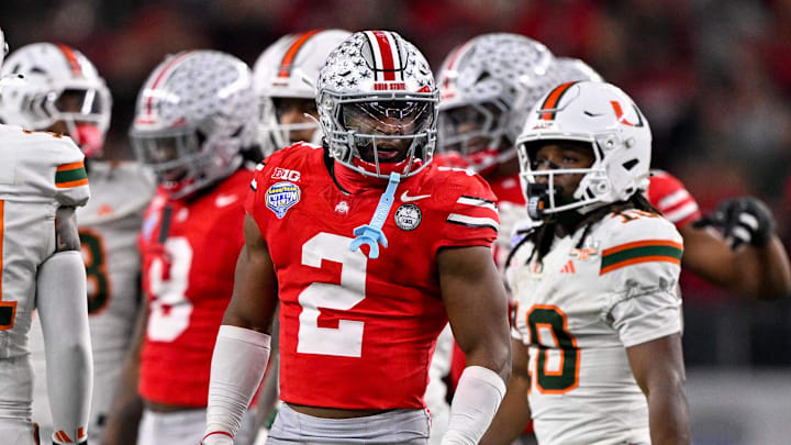 Ohio State Buckeyes safety Caleb Downs celebrates a defensive stop during the 2025 Cotton Bowl Ohio State Buckeyes safety Caleb Downs celebrates a defensive stop during the 2025 Cotton Bowl