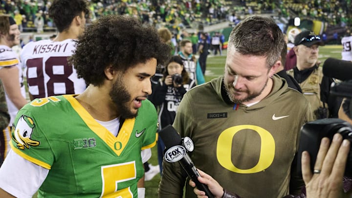 oregon ducks dan lanning quarterback dante moore college playoff kenyon sadiq nfl draft nil mel kiper arch manning evan stewart