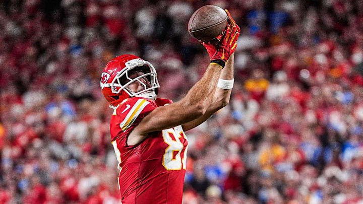 Kansas City Chiefs tight end Travis Kelce (87 makes a catch for a first down against Detroit Lions cornerback Rock Ya-Sin (23) during the second half at Arrowhead Stadium in Kansas City, Missouri on Sunday, Oct. 12, 2025.