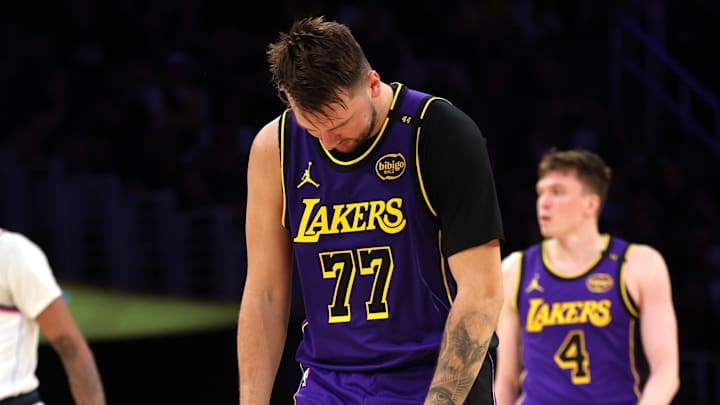 Feb 28, 2025; Los Angeles, California, USA; Los Angeles Lakers guard Luka Doncic (77) reacts after a play during the second quarter against the LA Clippers at Crypto.com Arena. Mandatory Credit: Jason Parkhurst-Imagn Images