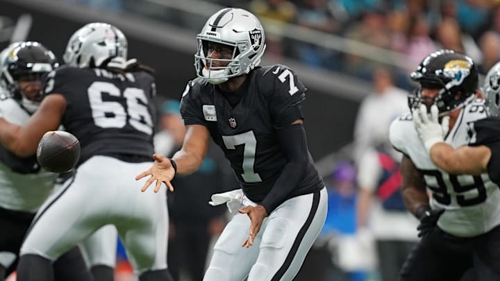 Nov 2, 2025; Paradise, Nevada, USA; Las Vegas Raiders quarterback Geno Smith (7) makes a catch during the first half against the Jacksonville Jaguars at Allegiant Stadium. Mandatory Credit: Kirby Lee-Imagn Images