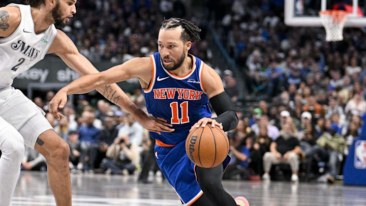 Nov 27, 2024; Dallas, Texas, USA; New York Knicks guard Jalen Brunson (11) drives to the basket past Dallas Mavericks center Dereck Lively II (2) during the second half at the American Airlines Center. Mandatory Credit: Jerome Miron-Imagn Images