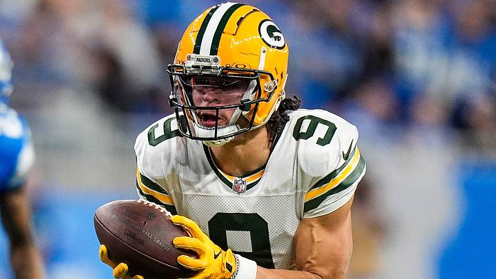 Green Bay Packers wide receiver Christian Watson (9) makes a catch against Detroit Lions at Ford Field.