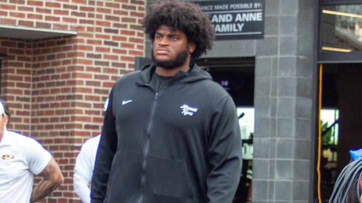 Sept 20, 2025; Columbia, Missouri, USA; Missouri Tigers left tackle Cayden Green exits the locker room in a boot ahead of the Missouri Tigers Week 4 matchup against South Carolina.