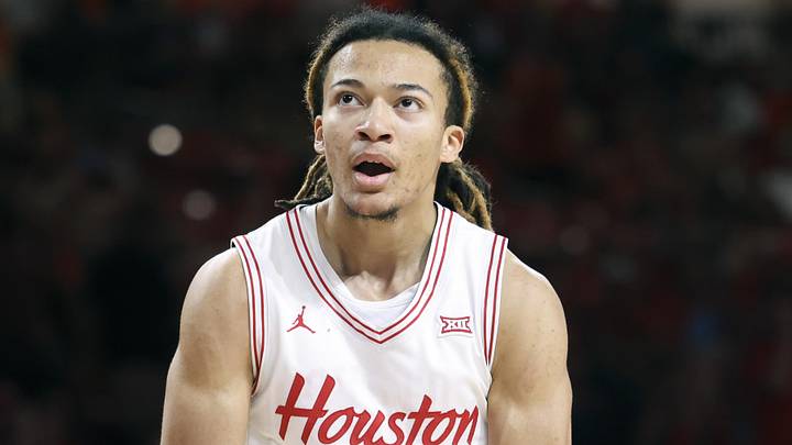 Houston Cougars guard Kingston Flemings (4) reacts after scoring a basket during the first half against the Towson Tigers at Fertitta Center on November 8, 2025.