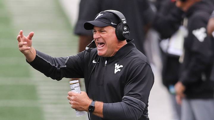 Oct 10, 2026; Morgantown, West Virginia, USA; West Virginia Mountaineers head coach Rich Rodriguez yells from the sideline during the second quarter against the Arizona Wildcats at Milan Puskar Stadium. Mandatory Credit: Ben Queen-Imagn Images Oct 10, 2026; Morgantown, West Virginia, USA; West Virginia Mountaineers head coach Rich Rodriguez yells from the sideline during the second quarter against the Arizona Wildcats at Milan Puskar Stadium. Mandatory Credit: Ben Queen-Imagn Images