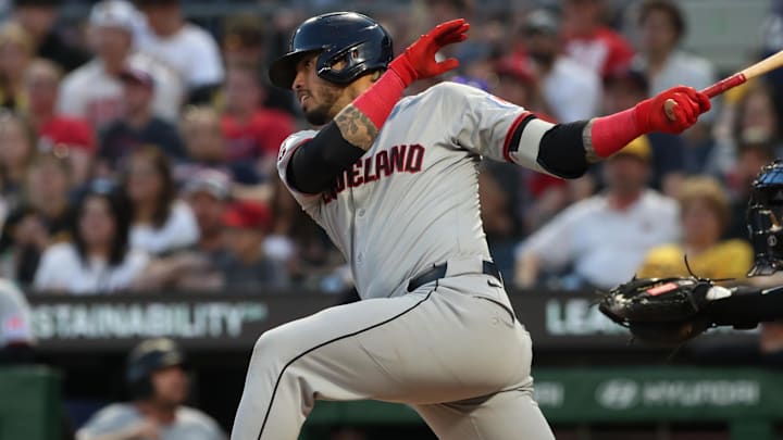 Apr 18, 2025; Pittsburgh, Pennsylvania, USA;  Cleveland Guardians shortstop Gabriel Arias (13) hits a single against the Pittsburgh Pirates during the fourth inning at PNC Park. Mandatory Credit: Charles LeClaire-Imagn Images