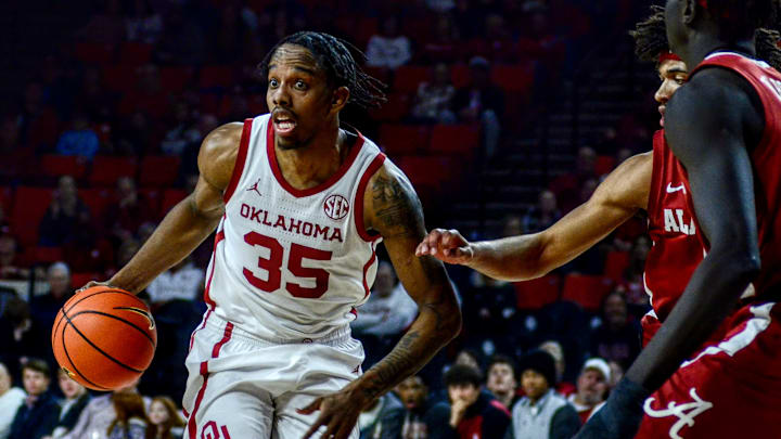 Oklahoma forward Derrion Reid drives against Alabama.