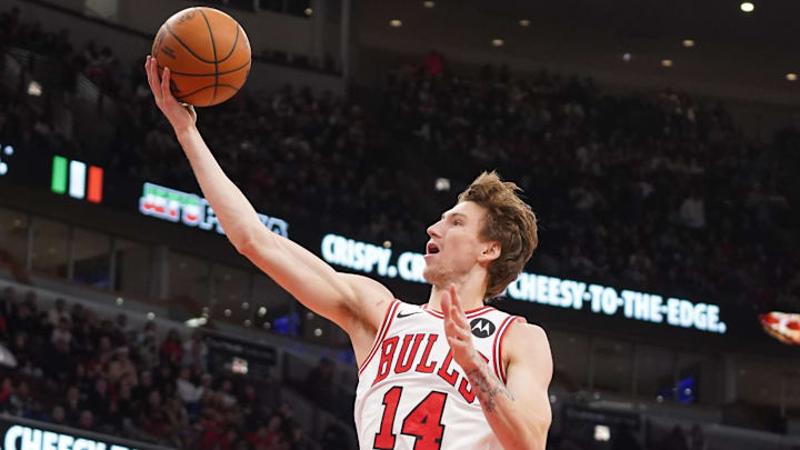 Feb 21, 2026; Chicago, Illinois, USA; Chicago Bulls forward Matas Buzelis (14) goes to the basket against the Detroit Pistons during the first half at United Center. Mandatory Credit: David Banks-Imagn Images