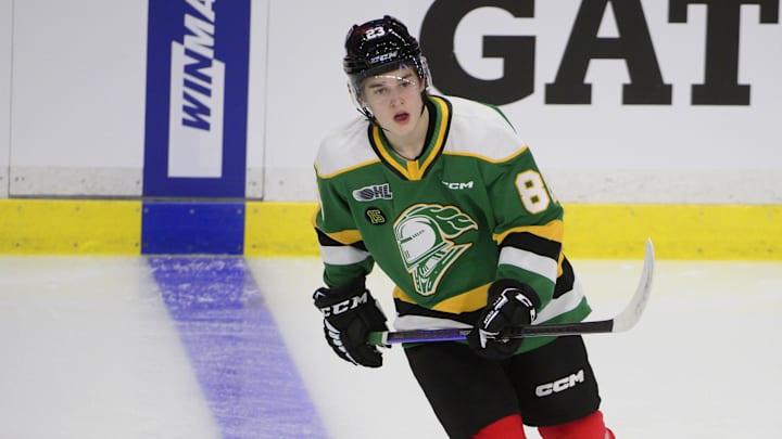 Jan 25, 2023; Langley, BC, CANADA; CHL Top Prospects team red forward Denver Barkey (23) warms up in the CHL Top Prospects ice hockey game at Langley Events Centre. Mandatory Credit: Anne-Marie Sorvin-Imagn Images