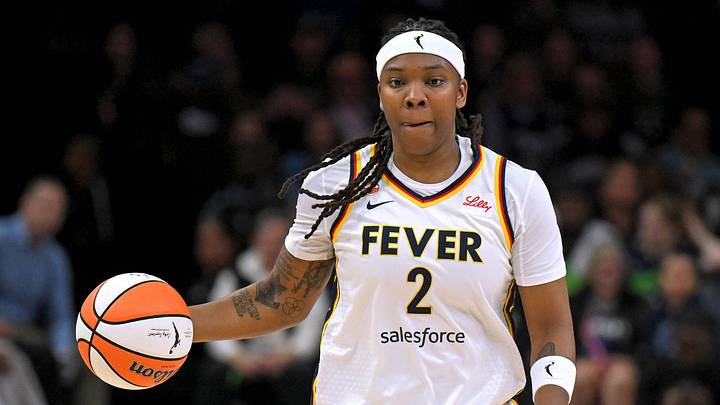 Indiana Fever forward Myisha Hines-Allen 2 controls the ball during the first half of a WNBA game. Indiana Fever forward Myisha Hines-Allen 2 controls the ball during the first half of a WNBA game.