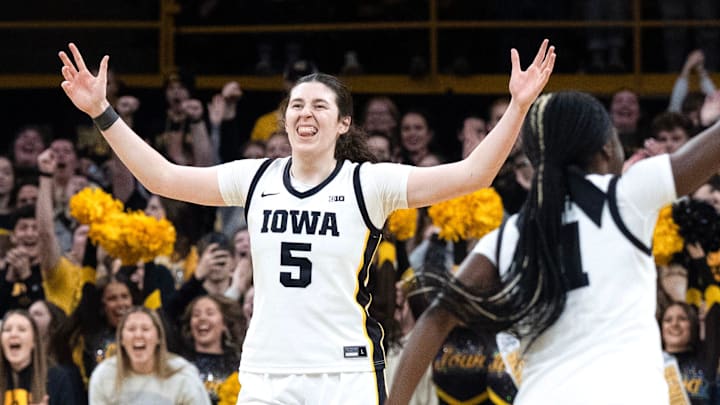Iowa center Ava Heiden (5) and Iowa guard Chit-Chat Wright (11) react during a game against the Michigan Wolverines Feb. 22, 2026 at Carver-Hawkeye Arena in Iowa City, Iowa.