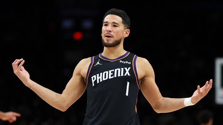 Jan 4, 2026; Phoenix, Arizona, USA; Phoenix Suns guard Devin Booker (1) reacts against the Oklahoma City Thunder in the first half at Mortgage Matchup Center. Mandatory Credit: Mark J. Rebilas-Imagn Images Jan 4, 2026; Phoenix, Arizona, USA; Phoenix Suns guard Devin Booker (1) reacts against the Oklahoma City Thunder in the first half at Mortgage Matchup Center. Mandatory Credit: Mark J. Rebilas-Imagn Images
