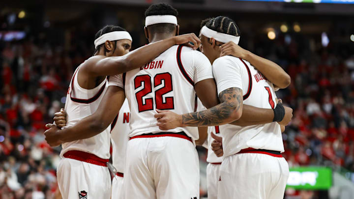 Jan 27, 2026; Raleigh, North Carolina, USA; NC State Wolfpack huddles during the first half of the game against the Syracuse Orange at Lenovo Center. Mandatory Credit: Jaylynn Nash-Imagn Images