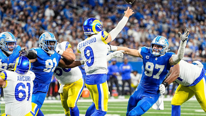 Detroit Lions defensive end Aidan Hutchinson (97) pressures Los Angeles Rams quarterback Matthew Stafford (9)