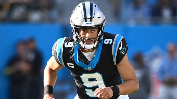 Dec 24, 2023; Charlotte, North Carolina, USA; Carolina Panthers quarterback Bryce Young (9) with the ball in the second quarter at Bank of America Stadium. Mandatory Credit: Bob Donnan-Imagn Images