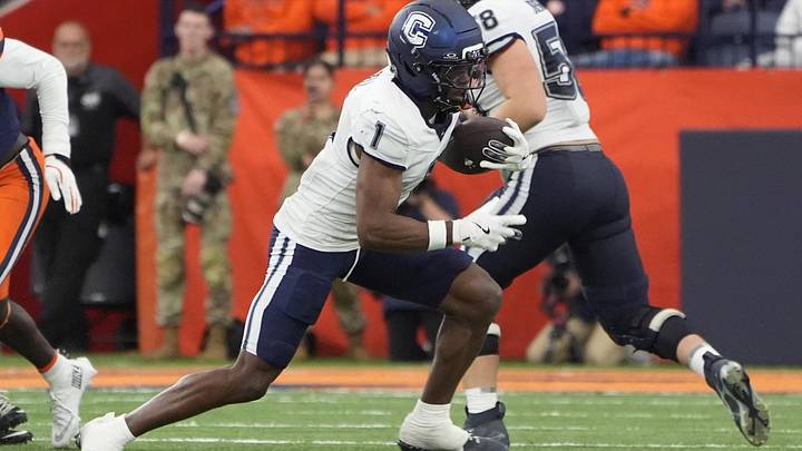 UConn Huskies wide receiver Skyler Bell runs after a catch against the Syracuse Orange.
