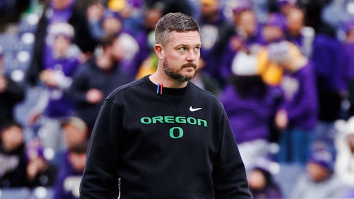 Oregon Ducks Washington Huskies uniforms husky stadium dan lanning NIL jedd fisch rivalry video villian playoff dante moore