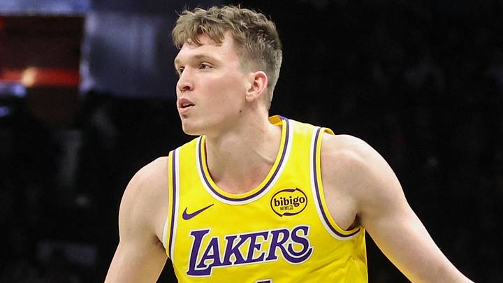 Feb 3, 2026; Brooklyn, New York, USA;  Los Angeles Lakers forward Dalton Knecht (4) looks to drive to the basket in the fourth quarter against the Brooklyn Nets at Barclays Center. Mandatory Credit: Wendell Cruz-Imagn Images