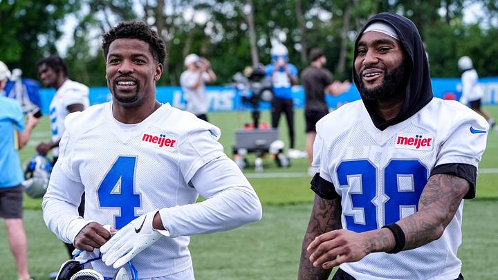 Detroit Lions cornerback D.J. Reed (4), left, talks to defensive back Nick Whiteside (38) after practice during mini camp at Meijer Performance Center in Allen Park on Tuesday, June 16, 2026. Detroit Lions cornerback D.J. Reed (4), left, talks to defensive back Nick Whiteside (38) after practice during mini camp at Meijer Performance Center in Allen Park on Tuesday, June 16, 2026.