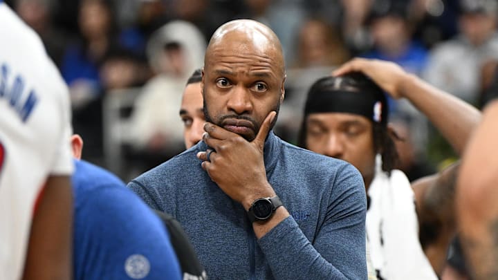 Jan 1, 2025; Detroit, Michigan, USA; Orlando Magic head coach Jamahl Mosley reacts as he watches trainers work on Detroit Pistons guard Jaden Ivey (not pictured) who injured his left leg against the Magic in the fourth quarter at Little Caesars Arena. Mandatory Credit: Lon Horwedel-Imagn Images Jan 1, 2025; Detroit, Michigan, USA; Orlando Magic head coach Jamahl Mosley reacts as he watches trainers work on Detroit Pistons guard Jaden Ivey (not pictured) who injured his left leg against the Magic in the fourth quarter at Little Caesars Arena. Mandatory Credit: Lon Horwedel-Imagn Images
