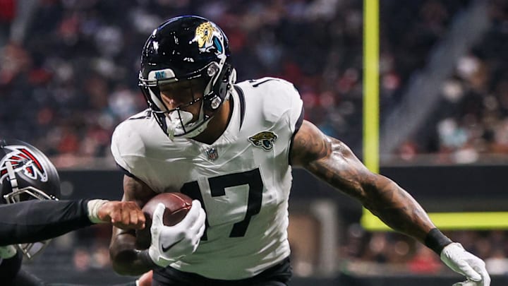 Aug 23, 2024; Atlanta, Georgia, USA; Jacksonville Jaguars tight end Evan Engram (17) is pushed out of bounds by Atlanta Falcons linebacker Bradlee Anae (47) in the second quarter at Mercedes-Benz Stadium. Mandatory Credit: Brett Davis-Imagn Images