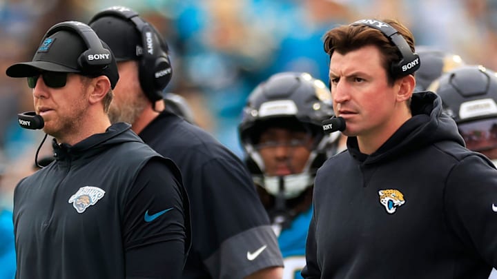 Jacksonville Jaguars head coach Liam Coen, left, and offensive coordinator Grant Udinski during the fourth quarter of an NFL football matchup at EverBank Stadium, Sunday, Jan. 4, 2026, in Jacksonville, Fla. The Jaguars defeated the Titans 41-7, capturing the AFC South title. [Corey Perrine/Florida Times-Union]