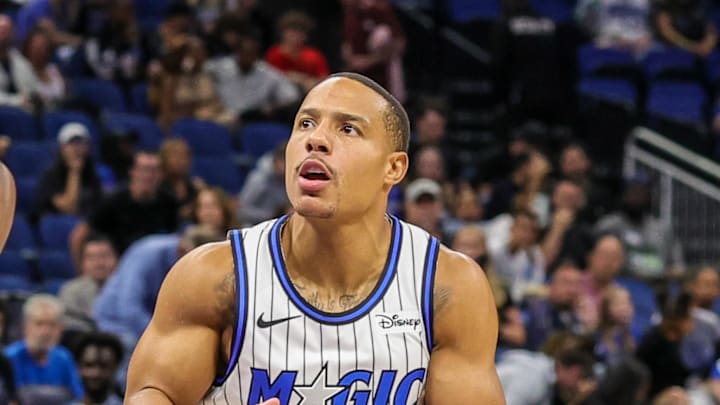 Orlando Magic guard Desmond Bane looks to shoot in front of New Orleans Pelicans center Yves Missi.