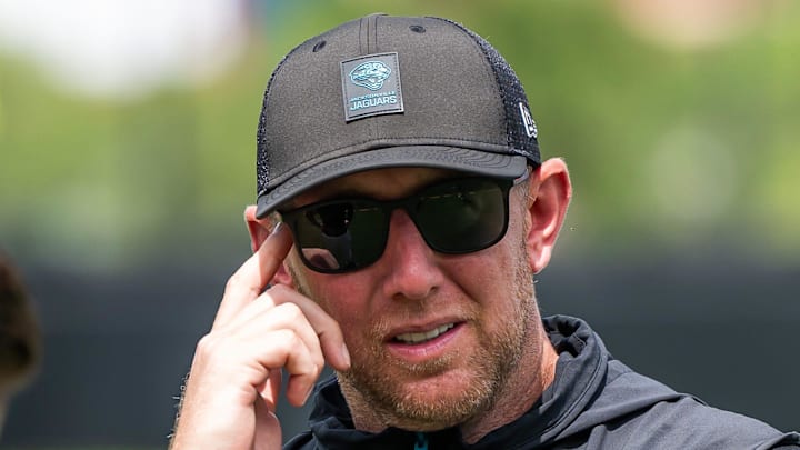 Jacksonville Jaguars general manager James Gladstone, left, talks with Jacksonville Jaguars head coach Liam Coen, right, after the. Jacksonville Jaguars’ mandatory minicamp Tuesday June 10, 2025 at the Miller Electric Center in Jacksonville, Fla. [Doug Engle/Florida Times-Union]