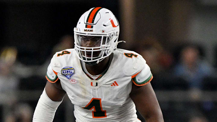Dec 31, 2025; Arlington, TX, USA; Miami Hurricanes defensive lineman Rueben Bain Jr. (4) rushes the line during the 2025 Cotton Bowl and quarterfinal game of the College Football Playoff at AT&T Stadium. Mandatory Credit: Jerome Miron-Imagn Images