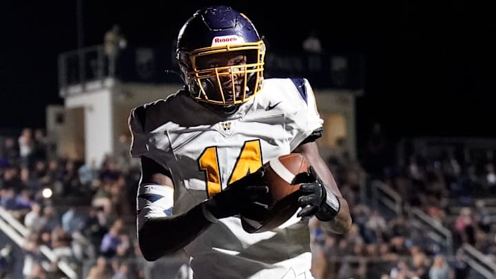 Webb’s Joel Wyatt (14) runs in a touchdown past Pope John Paul II's Reece Reynolds (15) during the second half at Pope Saint John Paul II Preparatory School in Hendersonville, Tenn., Friday, Sept. 13, 2024