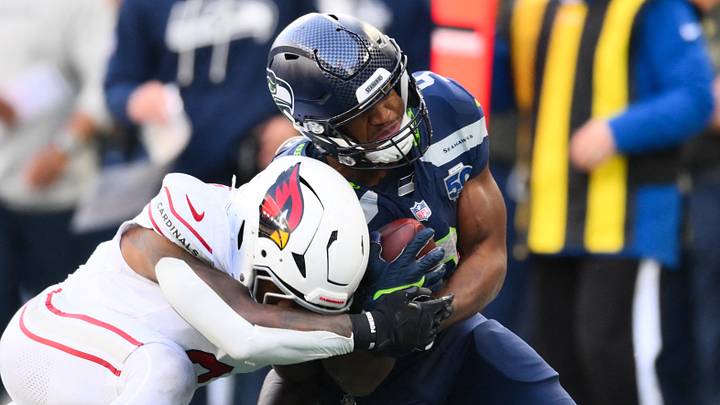 Nov 9, 2025; Seattle, Washington, USA; Seattle Seahawks running back Kenneth Walker III (9) is tackled out of bounds by Arizona Cardinals safety Budda Baker (3) during the second quarter at Lumen Field. Mandatory Credit: Steven Bisig-Imagn Images Nov 9, 2025; Seattle, Washington, USA; Seattle Seahawks running back Kenneth Walker III (9) is tackled out of bounds by Arizona Cardinals safety Budda Baker (3) during the second quarter at Lumen Field. Mandatory Credit: Steven Bisig-Imagn Images
