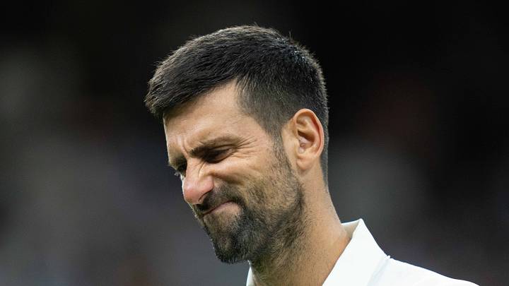 Novak Djokovic reacts during his match at Wimbledon