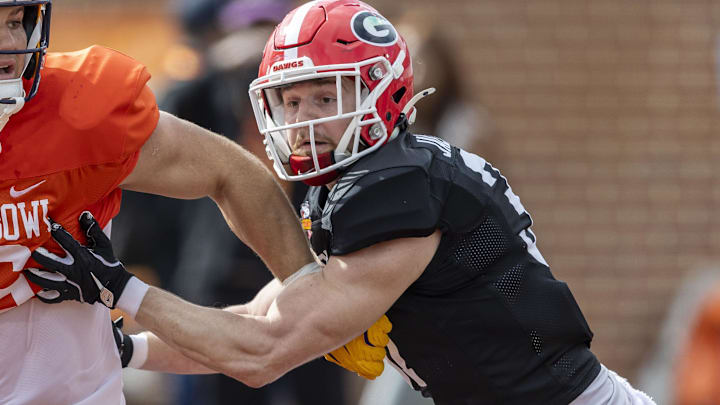 Jan 30, 2025; Mobile, AL, USA; American team tight end Mason Taylor of LSU (86) and American team defensive back Dan Jackson of Georgia (37) spar during Senior Bowl practice for the American team at Hancock Whitney Stadium. Mandatory Credit: Vasha Hunt-Imagn Images Jan 30, 2025; Mobile, AL, USA; American team tight end Mason Taylor of LSU (86) and American team defensive back Dan Jackson of Georgia (37) spar during Senior Bowl practice for the American team at Hancock Whitney Stadium. Mandatory Credit: Vasha Hunt-Imagn Images
