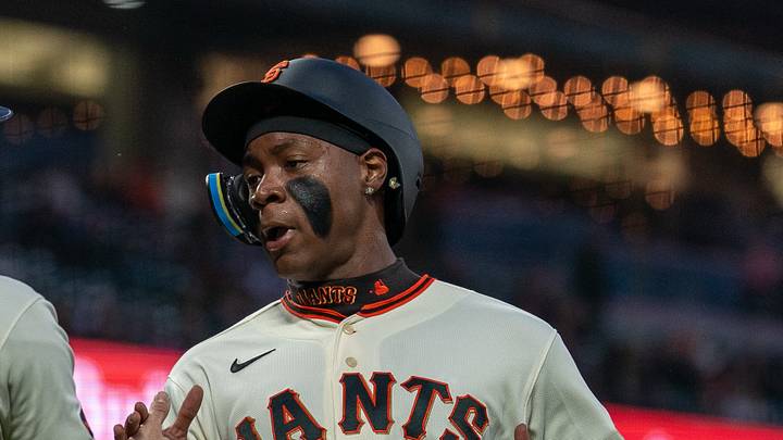 San Francisco, California, USA;  San Francisco Giants center fielder Drew Gilbert (0) and San Francisco Giants right fielder Bo Davidson (94) after scoring against the Minnesota Twins during the first inning at Oracle Park.  Mandatory Credit: Neville E. Guard-Imagn Images