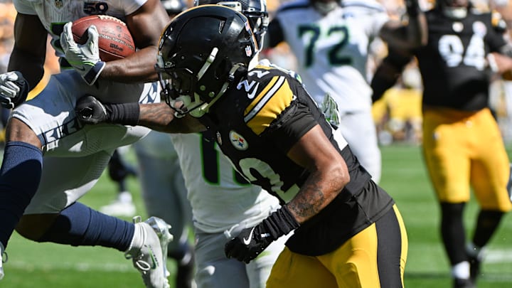 Sep 14, 2025; Pittsburgh, Pennsylvania, USA; Seattle Seahawks running back Kenneth Walker III (9) scores a touchdown past Pittsburgh Steelers safety Juan Thornhill (22) during the second half at Acrisure Stadium. Mandatory Credit: Barry Reeger-Imagn Images