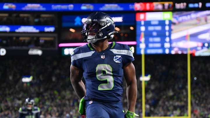 Jan 17, 2026; Seattle, WA, USA; Seattle Seahawks running back Kenneth Walker III (9) scores a touchdown against the San Francisco 49ers during the first half in an NFC Divisional Round game at Lumen Field. Mandatory Credit: Steven Bisig-Imagn Images