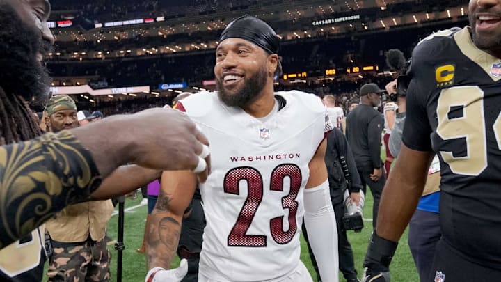 Dec 15, 2024; New Orleans, Louisiana, USA; New Orleans Saints linebacker Demario Davis (56) greets former teammate Washington Commanders cornerback Marshon Lattimore (23) next to New Orleans Saints defensive end Cameron Jordan (94) at the end of the game at Caesars Superdome. Mandatory Credit: Matthew Hinton-Imagn Images Dec 15, 2024; New Orleans, Louisiana, USA; New Orleans Saints linebacker Demario Davis (56) greets former teammate Washington Commanders cornerback Marshon Lattimore (23) next to New Orleans Saints defensive end Cameron Jordan (94) at the end of the game at Caesars Superdome. Mandatory Credit: Matthew Hinton-Imagn Images
