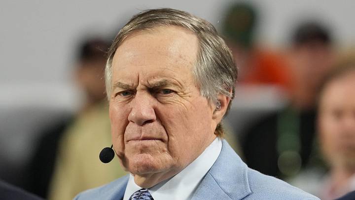 Jan 19, 2026; Miami Gardens, FL, USA; TV analyst Bill Belichick watches the Miami Hurricanes play the Indiana Hoosiers during the first half of the College Football Playoff National Championship game at Hard Rock Stadium. Mandatory Credit: Kirby Lee-Imagn Images Jan 19, 2026; Miami Gardens, FL, USA; TV analyst Bill Belichick watches the Miami Hurricanes play the Indiana Hoosiers during the first half of the College Football Playoff National Championship game at Hard Rock Stadium. Mandatory Credit: Kirby Lee-Imagn Images