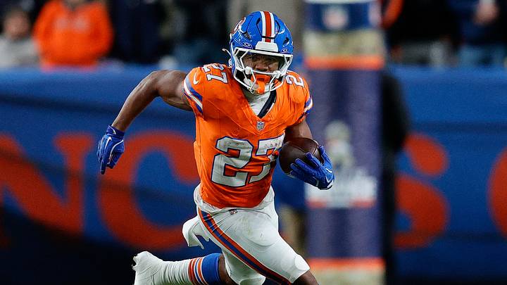 Denver Broncos running back J.K. Dobbins (27) runs the ball in the fourth quarter against the Las Vegas Raiders at Empower Field at Mile High. Denver Broncos running back J.K. Dobbins (27) runs the ball in the fourth quarter against the Las Vegas Raiders at Empower Field at Mile High.