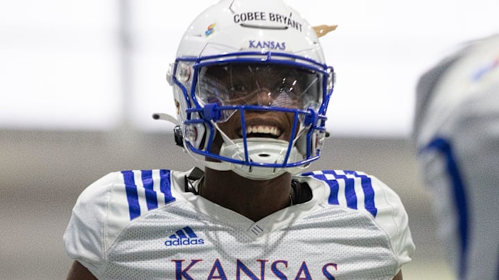 Kansas junior cornerback Cobee Bryant (2) looks towards players during Thursday's practice.