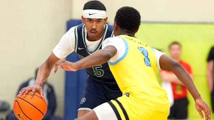 July 15, 2025; North Augusta, South Carolina, USA; Oakland Soldiers Jason Crowe Jr. (5) dribbles as Team Final RJ Smith (3) defends during the Oakland Soldiers and Team Final game at Nike EYBL Peach Jam at Riverview Park Activities Center. The Oakland Soldiers won 86-75. Mandatory Credit: Katie Goodale - Augusta Chronicle/USA TODAY NETWORK July 15, 2025; North Augusta, South Carolina, USA; Oakland Soldiers Jason Crowe Jr. (5) dribbles as Team Final RJ Smith (3) defends during the Oakland Soldiers and Team Final game at Nike EYBL Peach Jam at Riverview Park Activities Center. The Oakland Soldiers won 86-75. Mandatory Credit: Katie Goodale - Augusta Chronicle/USA TODAY NETWORK