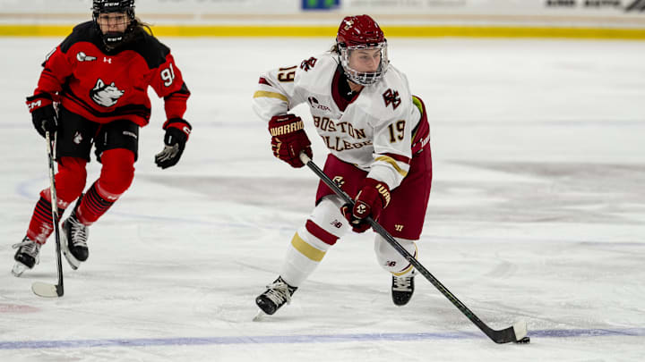 Boston College defender Jade Arnone corrals the puck against Northeastern on Saturday. The Eagles ended up losing 5-4 in overtime. Boston College defender Jade Arnone corrals the puck against Northeastern on Saturday. The Eagles ended up losing 5-4 in overtime.