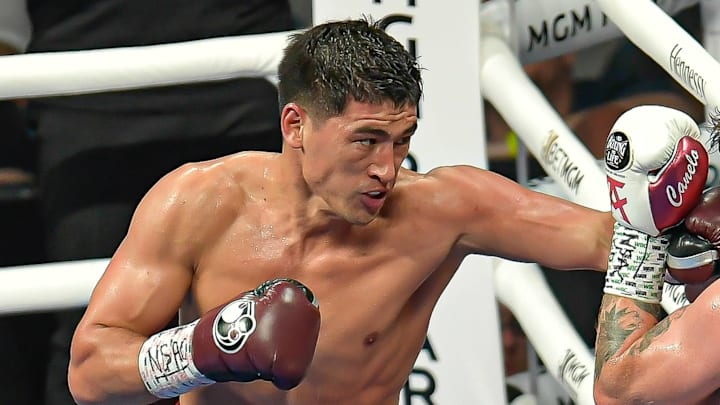 Dmitry Bivol lands a left hand on Canelo Alvarez. Dmitry Bivol lands a left hand on Canelo Alvarez.